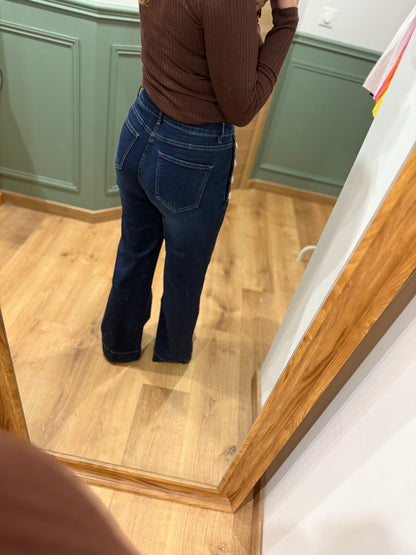 Jean taille haute à boutons latéraux