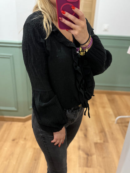 Blouse à volants et lien noué